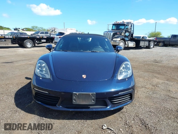 2018 Porsche 718 Boxster z VIN WP0CA2A8XJS210766, wystawiony jako IAAI lot #41617239 z przebiegiem 55 336 mil mil oraz . Historia ofert i sprzedaży dostępna na DreamBid. Obrazek 12.