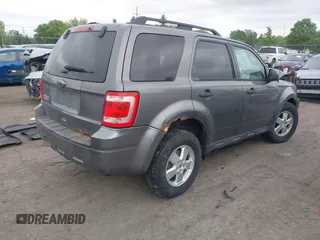 2012 Ford Escape XLT with VIN 1FMCU0D70CKB57640, listed as a IAAI auction lot 42364980 with 122,652 mi miles and . Bid and sale history available at DreamBid. Image 4.