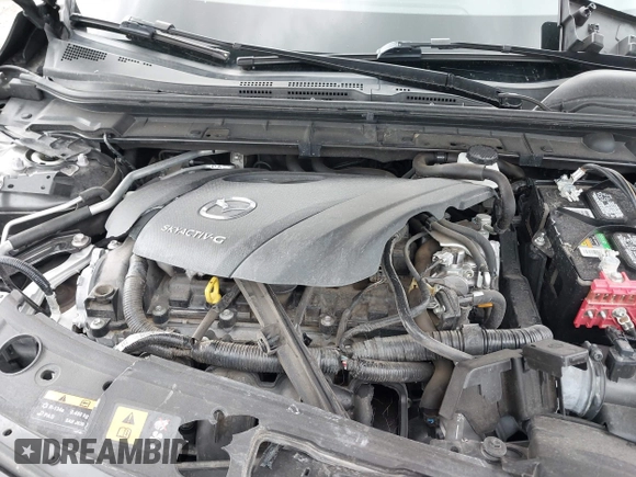 2021 Mazda 3 Premium z VIN JM1BPAML1M1318708, wystawiony jako IAAI lot #42178243 z przebiegiem 62 455 mil mil oraz . Historia ofert i sprzedaży dostępna na DreamBid. Obrazek 10.