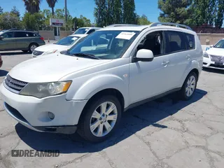 2007 Mitsubishi Outlander XLS z VIN JA4MT41X87Z022372, wystawiony jako IAAI lot #42342600 z przebiegiem 190 073 mil mil oraz . Historia ofert i sprzedaży dostępna na DreamBid. Obrazek 2.