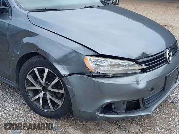 2013 Volkswagen Jetta S z VIN 3VW2K7AJ5DM369293, wystawiony jako IAAI lot #42172959 z przebiegiem 170 983 mil mil oraz . Historia ofert i sprzedaży dostępna na DreamBid. Obrazek 6.