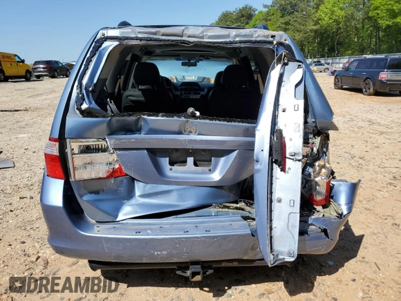 2005 Honda Odyssey EX-L z VIN 5FNRL386X5B034514, wystawiony jako Copart lot #52702435 z przebiegiem 65 988 mil mil oraz Szkoda całkowita • Salvage title. Historia ofert i sprzedaży dostępna na DreamBid. Obrazek 6.