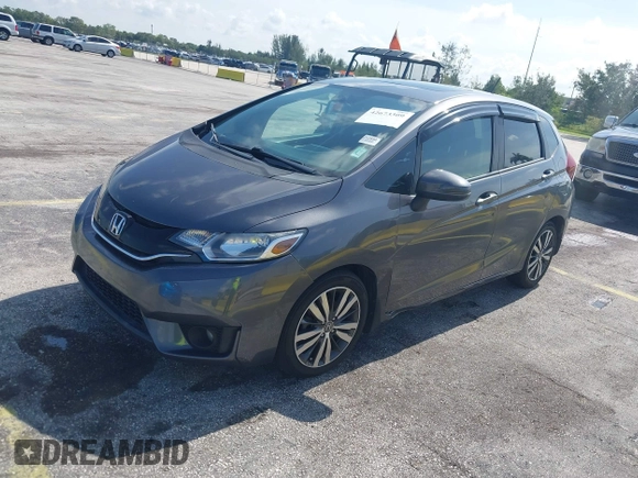 2015 Honda Fit EX-L z VIN 3HGGK5H89FM730013, wystawiony jako IAAI lot #42673309 z przebiegiem 142 660 mil mil oraz . Historia ofert i sprzedaży dostępna na DreamBid. Obrazek 18.