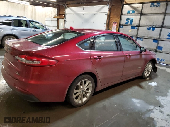 2019 Ford Fusion Hybrid SE with VIN 3FA6P0LU0KR220591, listed as a Copart auction lot 73487712 with 102,599 mi miles. Bid and sale history available at carsss.com. Image 3.