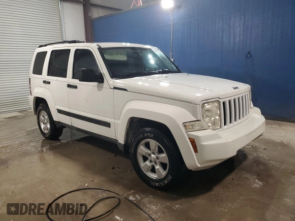 2010 Jeep Liberty Sport with VIN 1J4PP2GKXAW118062, listed as a Copart auction lot 47325445 with 206,134 mi miles and Clean Title. Bid and sale history available at DreamBid. Image 4.