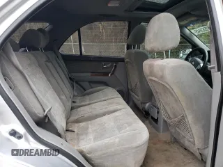 2005 Kia Sorento LX z VIN KNDJC733955455370, wystawiony jako Copart lot #47553645 z przebiegiem 195 471 mil mil oraz Szkoda całkowita • Salvage title. Historia ofert i sprzedaży dostępna na DreamBid. Obrazek 11.