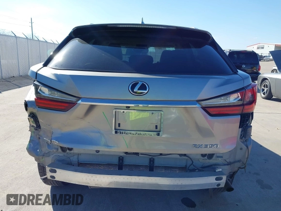 2020 Lexus RX with VIN 2T2AZMAA7LC173478, listed as a IAAI auction lot 41671494 with 91,777 mi miles. Bid and sale history available at carsss.com. Image 16.