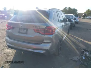 2021 BMW X3 M with VIN 5YMTS0C03M9F05142, listed as a IAAI auction lot 41264911 with 1 mi miles. Bid and sale history available at carsss.com. Image 4.