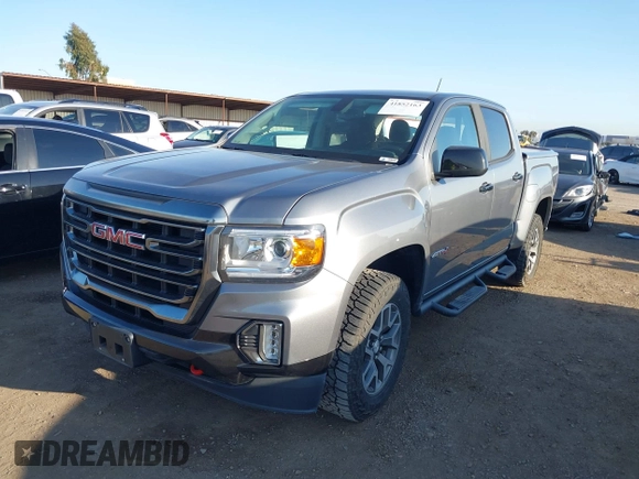 2021 GMC Canyon 4WD AT4 w/Leather with VIN 1GTG6FEN9M1123638, listed as a IAAI auction lot 41852163 with 77,442 mi miles. Bid and sale history available at carsss.com. Image 2.