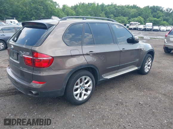 2012 BMW X5 35i with VIN 5UXZV4C59CL766849, listed as a IAAI auction lot 42749836 with 179,273 mi miles and . Bid and sale history available at DreamBid. Image 4.