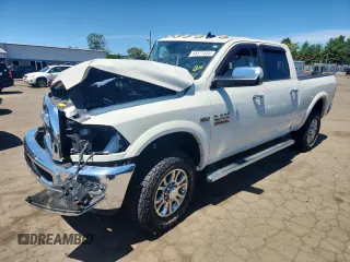 2017 Ram 2500 Laramie z VIN 3C6UR5FJ9HG648410, wystawiony jako Copart lot #65571835 z przebiegiem Nie podano mil oraz Szkoda całkowita • Salvage title. Historia ofert i sprzedaży dostępna na DreamBid. Obrazek 1.