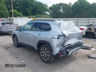 2023 Toyota Corolla Cross XLE with VIN 7MUDAAAG0PV057750, listed as a IAAI auction lot 42302284 with 31,404 mi miles and . Bid and sale history available at DreamBid. Image 3.