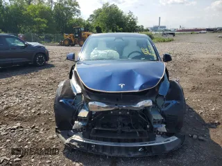 2024 Tesla Model Y Long Range with VIN 7SAYGAEEXRF983702, listed as a Copart auction lot 61536565 with Not provided miles and Salvage title. Bid and sale history available at DreamBid. Image 5.