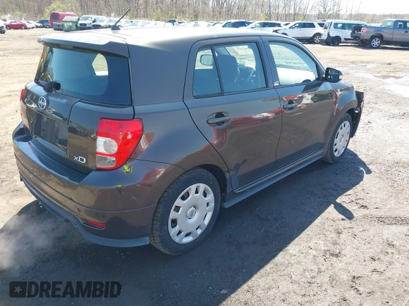 2011 Scion xD with VIN JTKKU4B41B1008733, listed as a IAAI auction lot 41967469 with 102,438 mi miles and . Bid and sale history available at DreamBid. Image 4.