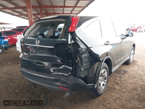2013 Honda CR-V LX with VIN 2HKRM3H36DH511653, listed as a IAAI auction lot 39041262 with 90,336 mi miles and . Bid and sale history available at DreamBid. Image 4.