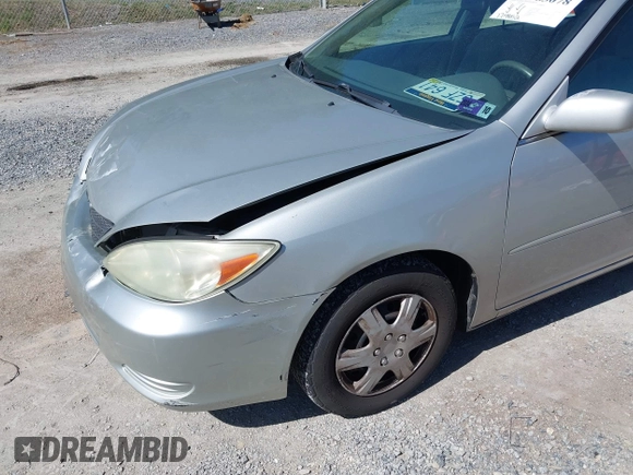 2004 Toyota Camry LE with VIN 4T1BE30K14U290983, listed as a IAAI auction lot 41983078 with 174,852 mi miles and . Bid and sale history available at carsss.com. Image 17.