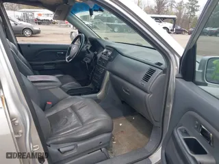 2005 Honda Pilot EX-L with RES with VIN 5FNYF18695B018134, listed as a IAAI auction lot 41962595 with 264,599 mi miles. Bid and sale history available at carsss.com. Image 5.
