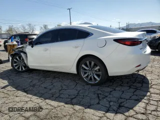 2021 Mazda 6 Touring with VIN JM1GL1VM0M1612027, listed as a Copart auction lot 48262185 with 67,568 mi miles and Salvage Title. Bid and sale history available at DreamBid. Image 2.