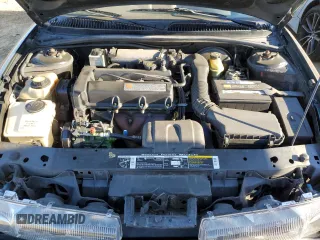 1996 Saturn SL z VIN 1G8ZK527XTZ335205, wystawiony jako Copart lot #42230735 z przebiegiem 82 344 mil mil oraz Szkoda całkowita • Salvage title. Historia ofert i sprzedaży dostępna na DreamBid. Obrazek 12.