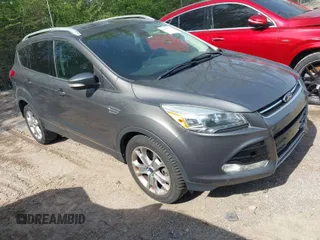2014 Ford Escape Titanium with VIN 1FMCU9J98EUB66961, listed as a IAAI auction lot 42057914 with 101,943 mi miles. Bid and sale history available at carsss.com. Image 1.