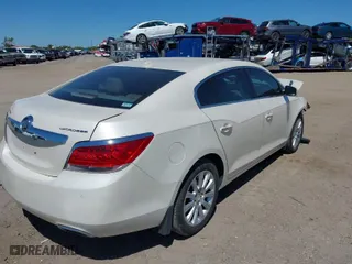 2013 Buick LaCrosse Leather with VIN 1G4GC5E39DF326464, listed as a IAAI auction lot 41859174 with 59,414 mi miles. Bid and sale history available at carsss.com. Image 4.