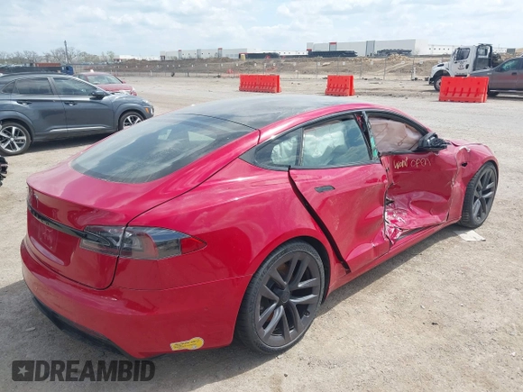 2022 Tesla Model S with VIN 5YJSA1E58NF463643, listed as a IAAI auction lot 41861483 with Not Provided miles and . Bid and sale history available at DreamBid. Image 4.