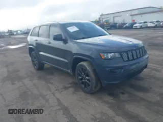 2018 Jeep Grand Cherokee Altitude with VIN 1C4RJFAG4JC264177, listed as a IAAI auction lot 42212396 with 96,349 mi miles and . Bid and sale history available at DreamBid. Image 1.