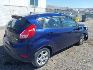 2016 Ford Fiesta SE z VIN 3FADP4EJ8GM150098, wystawiony jako IAAI lot #41890402 z przebiegiem 126 492 mil mil oraz . Historia ofert i sprzedaży dostępna na DreamBid. Obrazek 4.