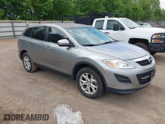2012 Mazda CX-9 Touring with VIN JM3TB2CV6C0343840, listed as a IAAI auction lot 42221257 with 148,409 mi miles and . Bid and sale history available at carsss.com. Image 1.
