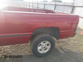 1999 Dodge 1500 z VIN 1B7HF16Y2XS185896, wystawiony jako IAAI lot #42251046 z przebiegiem 258 932 mil mil oraz . Historia ofert i sprzedaży dostępna na DreamBid. Obrazek 16.