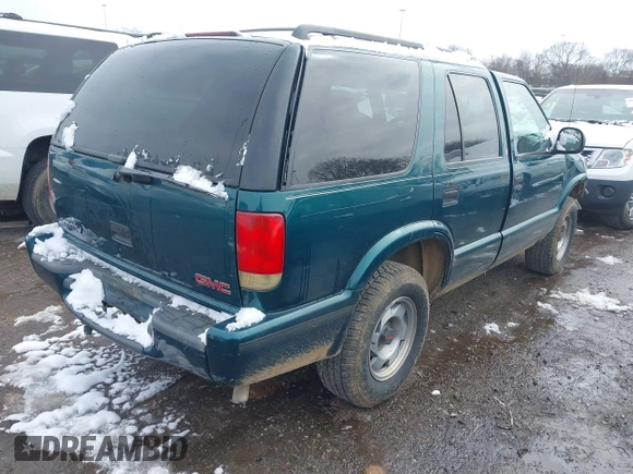 1998 GMC Jimmy SL with VIN 1GKCS13W4W2562613, listed as a IAAI auction lot 41610601 with 1 mi miles. Bid and sale history available at carsss.com. Image 4.