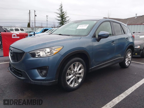 2015 Mazda CX-5 Grand Touring with VIN JM3KE4DY0F0493969, listed as a IAAI auction lot 41581885 with 71,014 mi miles. Bid and sale history available at carsss.com. Image 19.