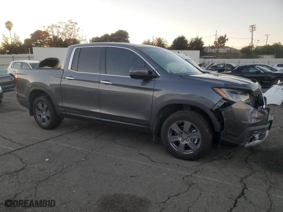 2020 Honda Ridgeline RTL-E with VIN 5FPYK3F73LB010893, listed as a Copart auction lot 82676714 with 71,903 mi miles and Salvage Title. Bid and sale history available at carsss.com. Image 4.