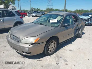 2006 Ford Taurus SE with VIN 1FAFP53U96A223924, listed as a IAAI auction lot 41828443 with 114,653 mi miles. Bid and sale history available at carsss.com. Image 6.