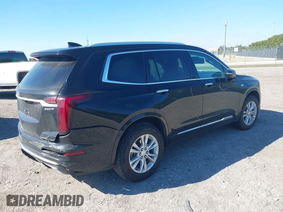 2021 Cadillac XT6 Luxury with VIN 1GYKPAR48MZ171154, listed as a IAAI auction lot 41639465 with 41,183 mi miles. Bid and sale history available at carsss.com. Image 4.