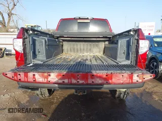 2017 Nissan Titan Pro-4X z VIN 1N6BA1F43HN562377, wystawiony jako IAAI lot #41786607 z przebiegiem 95 207 mil mil oraz . Historia ofert i sprzedaży dostępna na DreamBid. Obrazek 17.