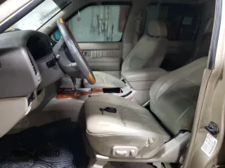 2002 Infiniti QX4 Luxury z VIN JNRDR09Y12W256115, wystawiony jako Copart lot #46263245 z przebiegiem 162 238 mil mil oraz Szkoda całkowita • Salvage title. Historia ofert i sprzedaży dostępna na DreamBid. Obrazek 7.