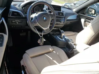 2016 BMW 2 Series 228i with VIN WBA1K9C50GV710942, listed as a Copart auction lot 77700934 with 28,643 mi miles and Salvage Title. Bid and sale history available at carsss.com. Image 8.