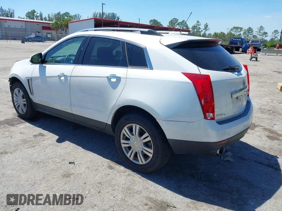 2016 Cadillac SRX Luxury Collection z VIN 3GYFNEE34GS513728, wystawiony jako IAAI lot #41847871 z przebiegiem 109 045 mil mil oraz . Historia ofert i sprzedaży dostępna na DreamBid. Obrazek 3.