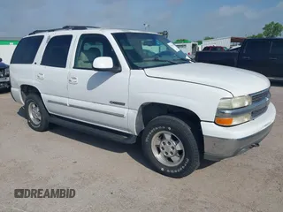 2001 Chevrolet Tahoe LS z VIN 1GNEC13T61R112072, wystawiony jako IAAI lot #42471193 z przebiegiem 326 879 mil mil oraz . Historia ofert i sprzedaży dostępna na DreamBid. Obrazek 1.