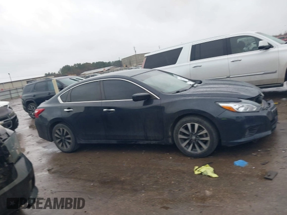 2017 Nissan Altima SV with VIN 1N4AL3AP8HC112294, listed as a IAAI auction lot 41462308 with 139,774 mi miles and . Bid and sale history available at DreamBid. Image 14.