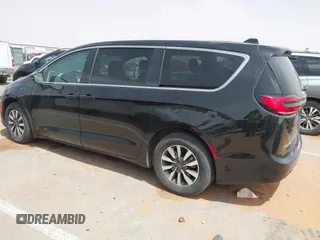2023 Chrysler Pacifica Hybrid Touring L с VIN 2C4RC1L78PR551371, выставлен на аукционе IAAI как лот 42235410 с пробегом 49 519 миль миль и . История ставок и продаж доступна на DreamBid. Изображение 14.