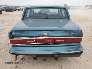 1993 Dodge Dynasty LE z VIN 1B3XC56R3PD124521, wystawiony jako Copart lot #51825725 z przebiegiem 94 336 mil mil oraz Szkoda całkowita • Salvage title. Historia ofert i sprzedaży dostępna na DreamBid. Obrazek 6.
