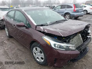 2017 Kia Forte LX with VIN 3KPFK4A7XHE071992, listed as a IAAI auction lot 42039101 with 76,682 mi miles. Bid and sale history available at carsss.com. Image 1.