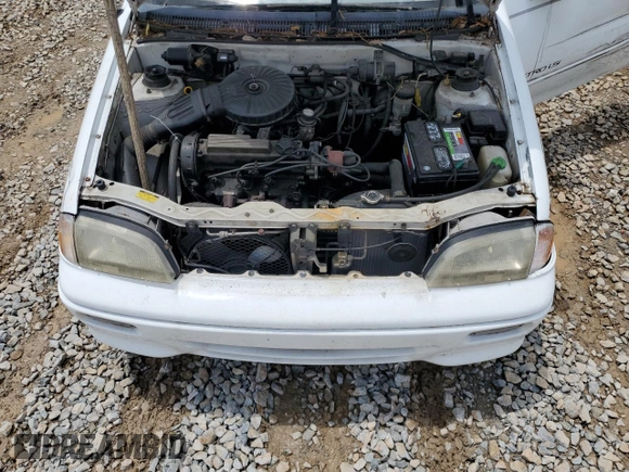1993 Geo Metro z VIN JG1MR3362PK209644, wystawiony jako Copart lot #58749655 z przebiegiem 149 163 mil mil oraz Szkoda całkowita • Salvage title. Historia ofert i sprzedaży dostępna na DreamBid. Obrazek 11.