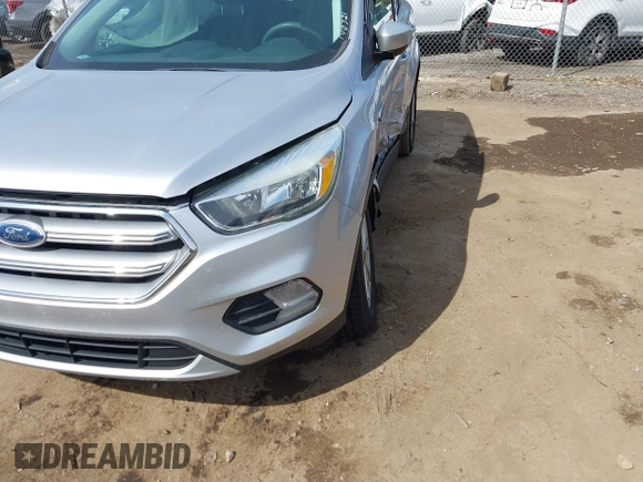 2017 Ford Escape SE with VIN 1FMCU9G95HUA10906, listed as a IAAI auction lot 41841566 with 132,777 mi miles. Bid and sale history available at carsss.com. Image 6.