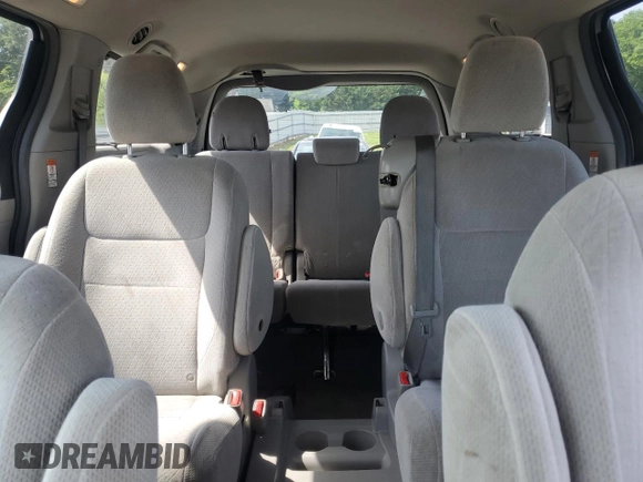 2015 Toyota Sienna LE AAS with VIN 5TDKK3DC9FS609084, listed as a Copart auction lot 57055295 with 247,531 mi miles and Salvage title. Bid and sale history available at DreamBid. Image 10.