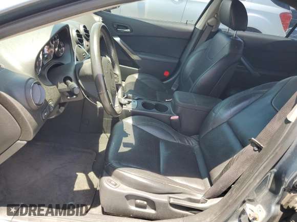 2005 Pontiac G6 GT z VIN 1G2ZH528854112243, wystawiony jako Copart lot #58385755 z przebiegiem 67 704 mil mil oraz Szkoda całkowita • Salvage title. Historia ofert i sprzedaży dostępna na DreamBid. Obrazek 7.