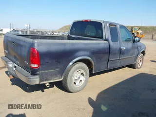 1999 Ford F-150 with VIN 2FTRX17L8XCB23329, listed as a IAAI auction lot 41448347 with 223,517 mi miles and . Bid and sale history available at DreamBid. Image 4.
