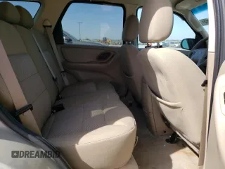 2005 Ford Escape XLT with VIN 1FMYU93105KC50944, listed as a Copart auction lot 50500965 with 133,532 mi miles and Salvage Title. Bid and sale history available at DreamBid. Image 11.